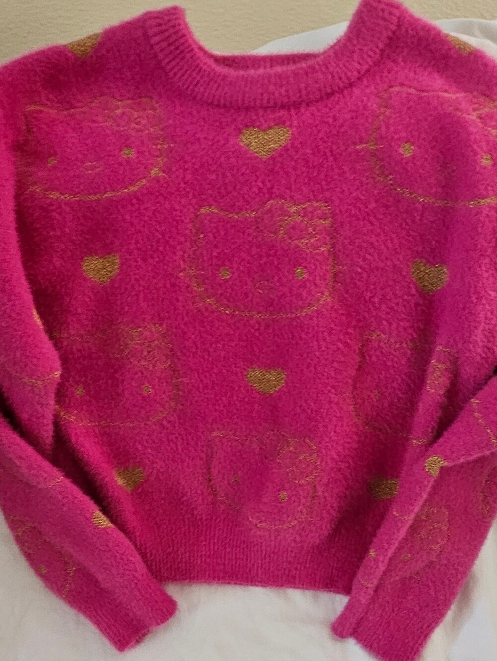 Sanrio Hot Pink Crewneck Sweater with Gold Hello Kitty Motifs